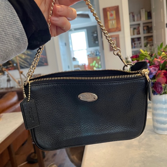small black coach purse with gold chain